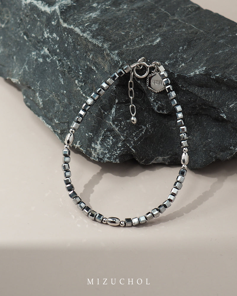Mantra of Hematite Bracelet - रक्षा (Raksha)