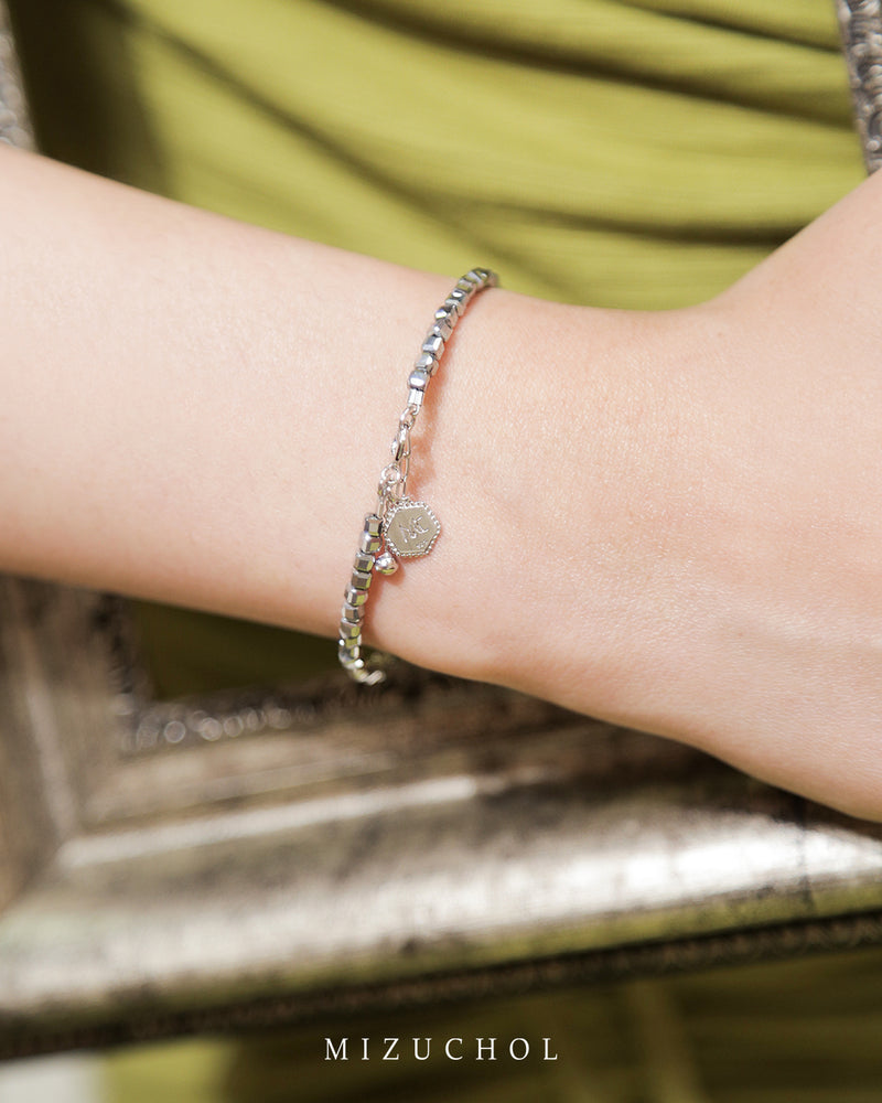 Mantra of Hematite Bracelet - रक्षा (Raksha)